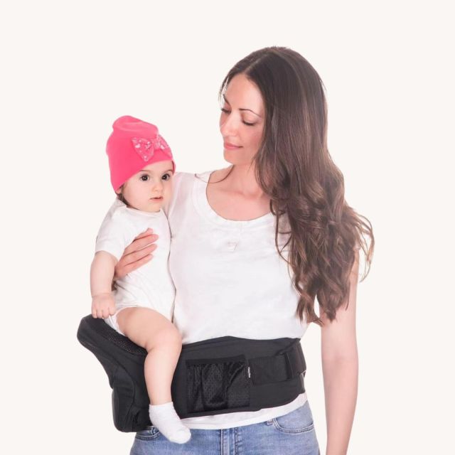 woman with hip baby carrier