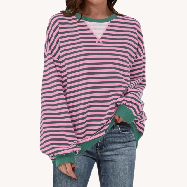 woman wearing striped sweatshirt