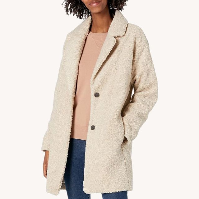 woman wearing beige teddy coat