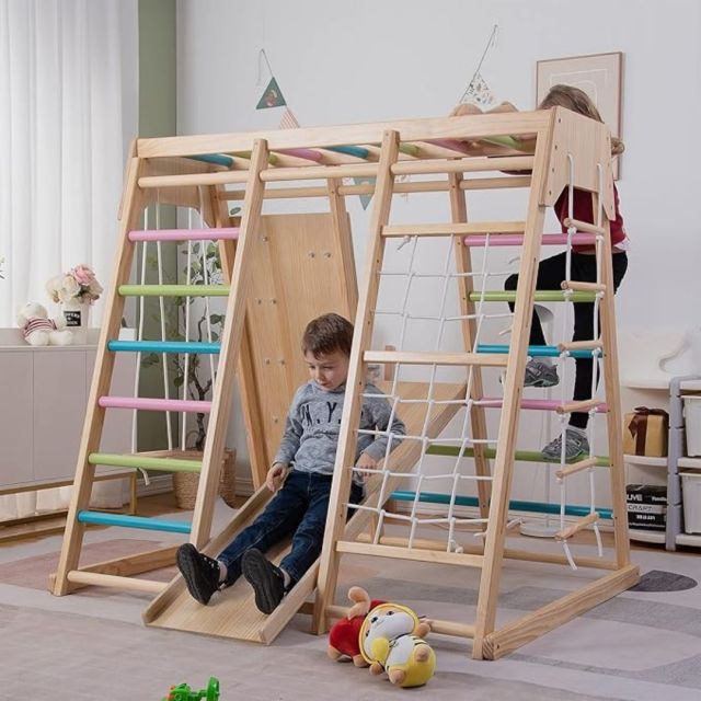 children playing on indoor wooden play set