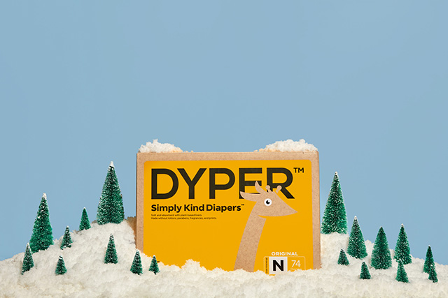 a box of dyper diapers with a wintery blue background