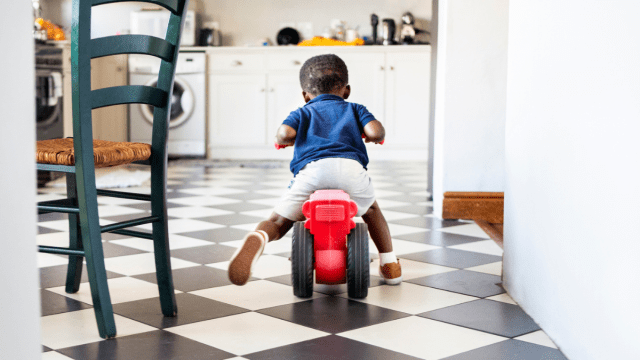 toddler riding away on ride on and not listening to parents