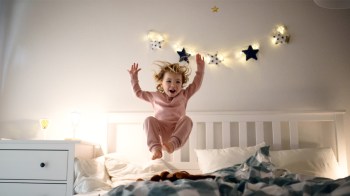 a picture of a kid who is wired before bedtime