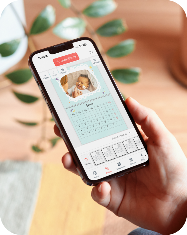 The photo book editor on a phone in the new tinybeans photo store