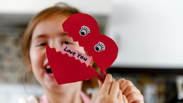 little girl laughing at Valentine's Day Jokes for Kids