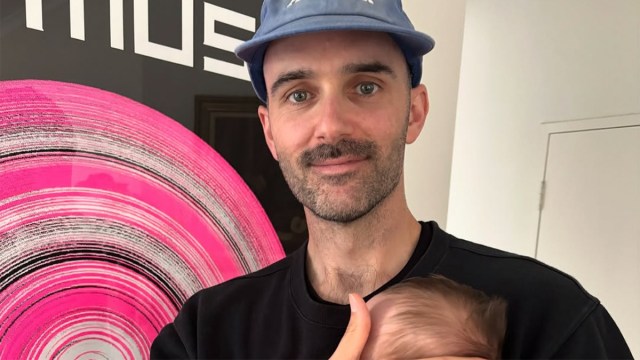 nonpracticinggenius with his baby sharing a dads best parenting advice