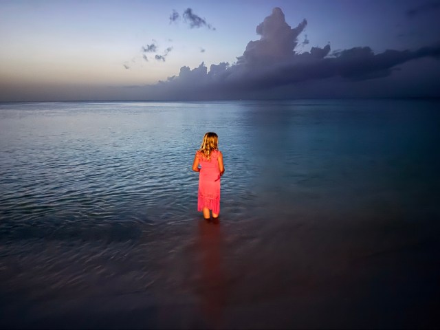 girl on horse in caribbean ocean turks and caicos