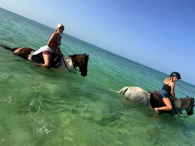 mother daughter Turks and Caicos horseback ride in the ocean